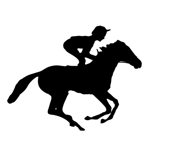 Black and white silhouette of man riding galloping race horse.